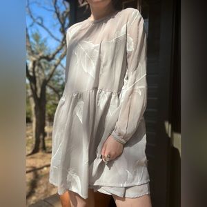 Urban Outfitters long sleeve grey babydoll dress w white feathers embroidered.